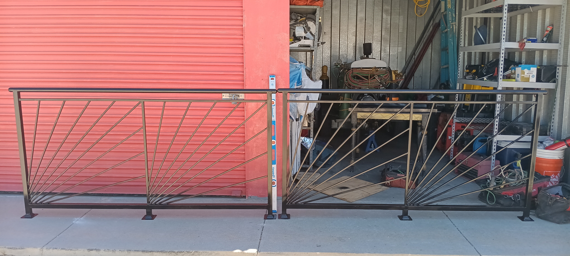 Custom sunburst iron railings at fabrication shop